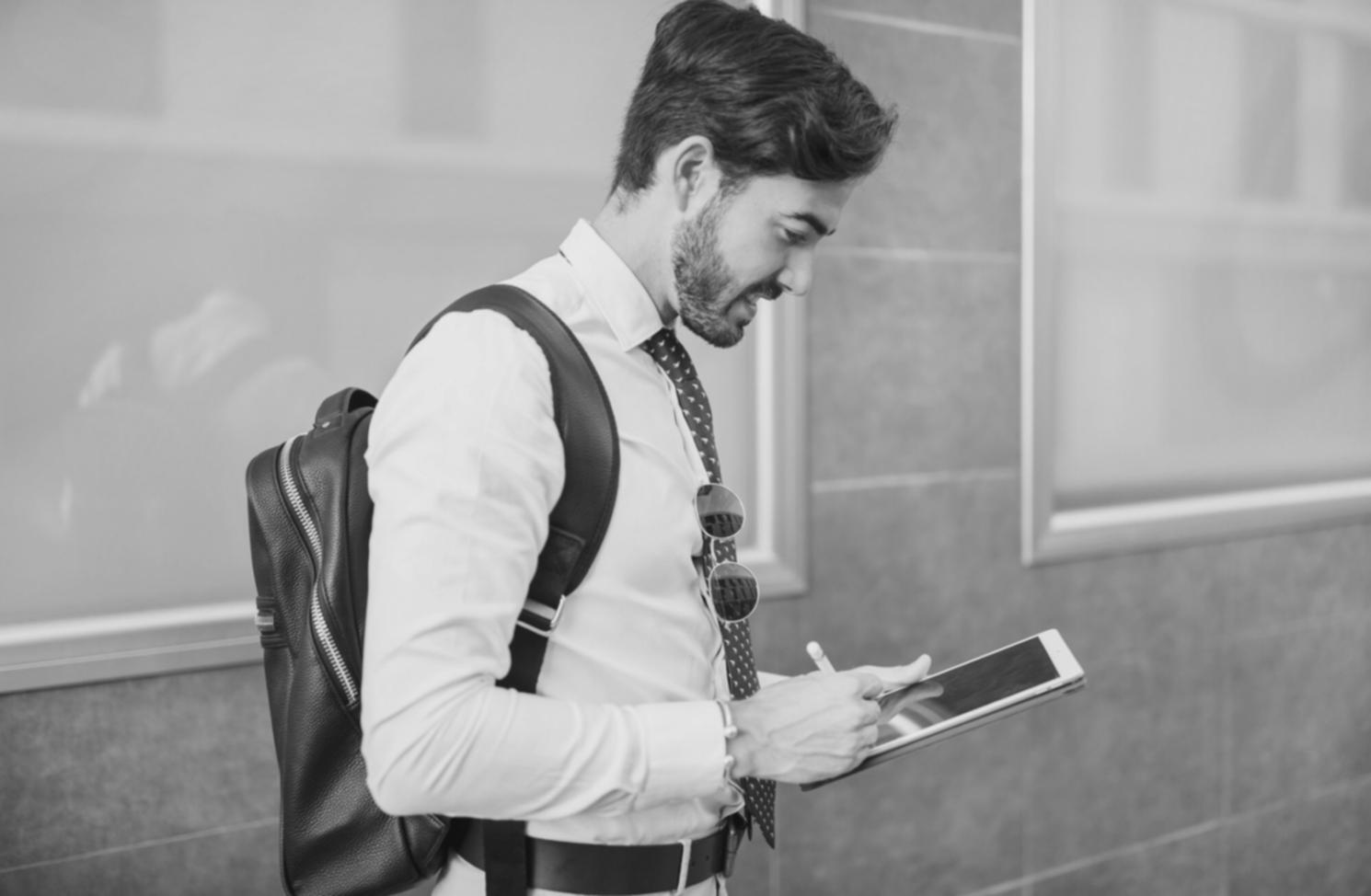 Student reviewing personal budget with instructor guidance